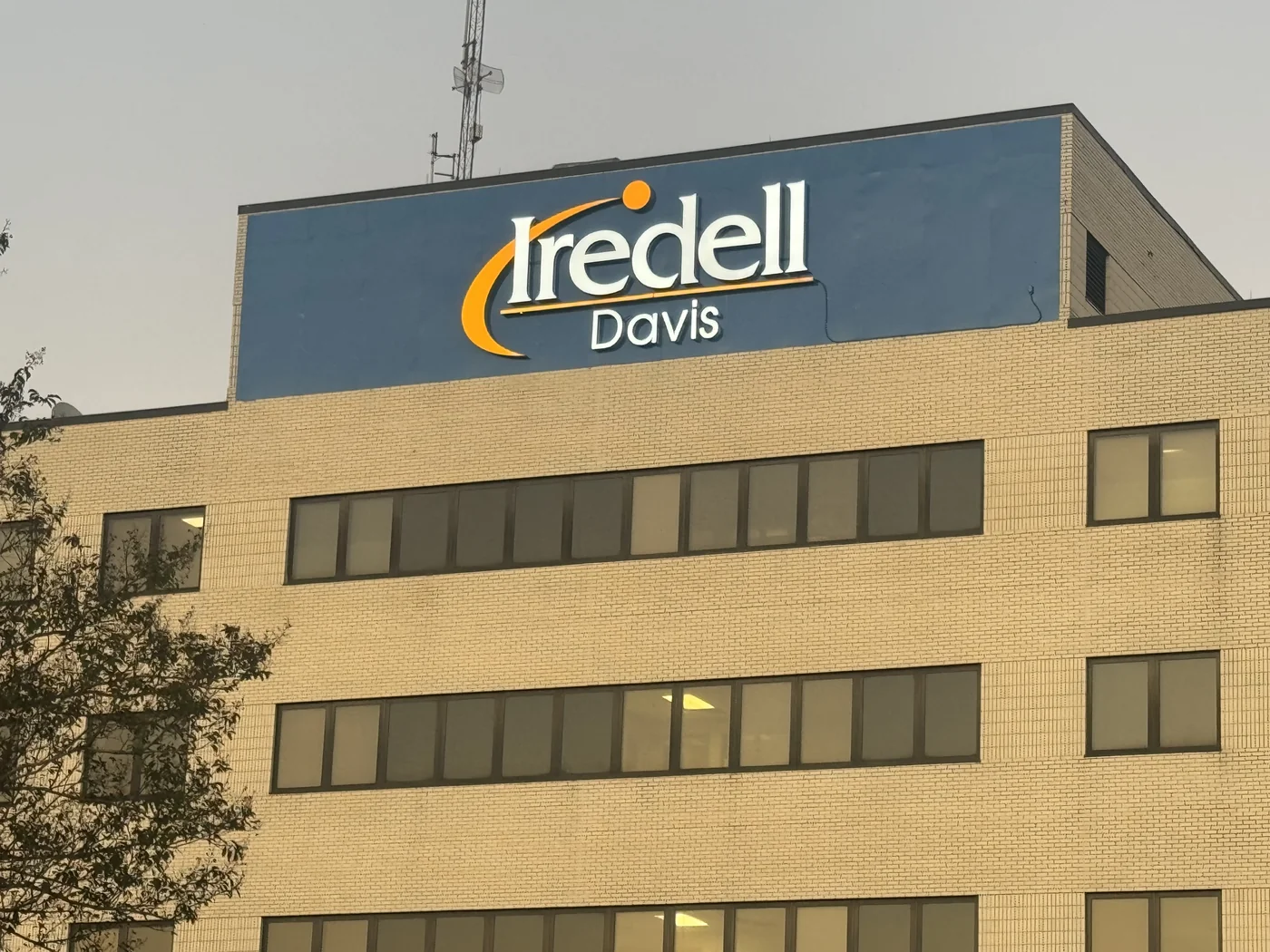 Iredell Davis lettering mounted high on a building facade